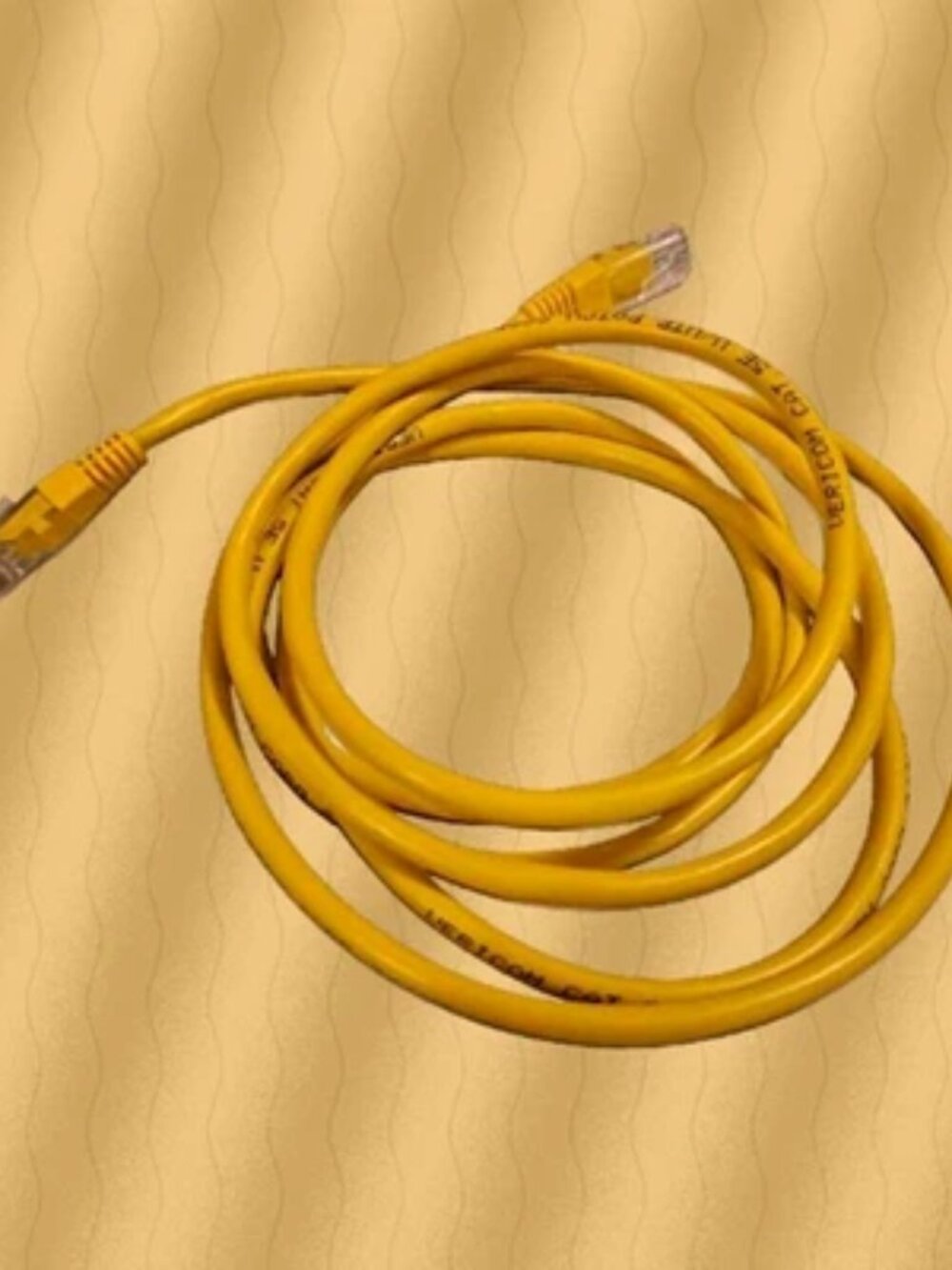 Cat 5e RJ-45 to RJ-45 Ethernet Network Cable 10 ft Yellow Round
